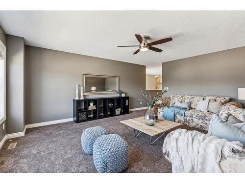 63 Jumping Pound Terrace, Cochrane, AB - Indoor Photo Showing Living Room