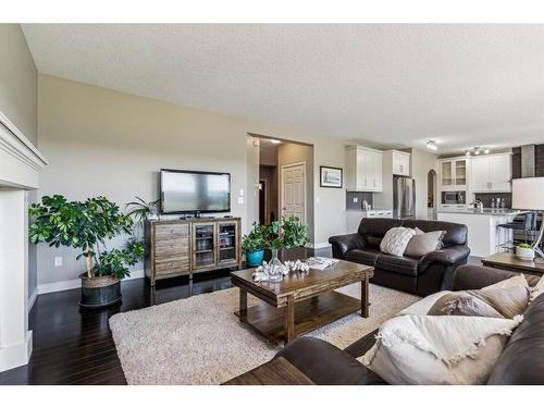 63 Jumping Pound Terrace, Cochrane, AB - Indoor Photo Showing Living Room