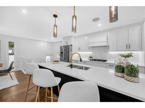 1028 Lake Ontario Drive Se, Calgary, AB - Indoor Photo Showing Kitchen With Double Sink With Upgraded Kitchen