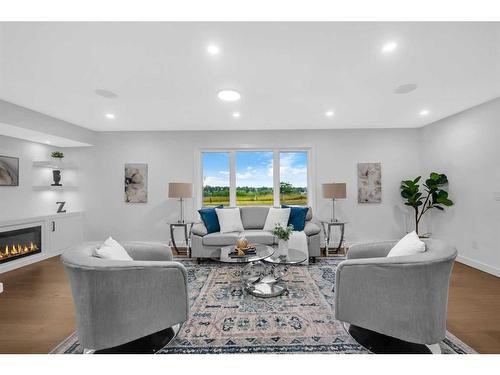 1028 Lake Ontario Drive Se, Calgary, AB - Indoor Photo Showing Living Room With Fireplace