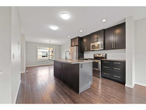 205 Evansridge Park Nw, Calgary, AB - Indoor Photo Showing Kitchen With Stainless Steel Kitchen With Upgraded Kitchen