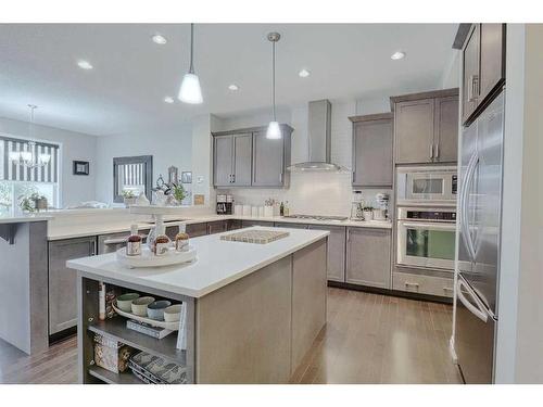 116 Sunset Manor, Cochrane, AB - Indoor Photo Showing Kitchen With Upgraded Kitchen