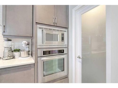 116 Sunset Manor, Cochrane, AB - Indoor Photo Showing Kitchen