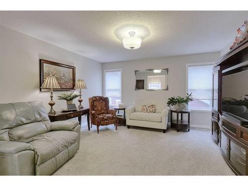 116 Sunset Manor, Cochrane, AB - Indoor Photo Showing Living Room