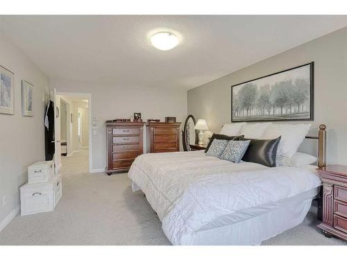 116 Sunset Manor, Cochrane, AB - Indoor Photo Showing Bedroom