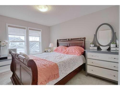 116 Sunset Manor, Cochrane, AB - Indoor Photo Showing Bedroom