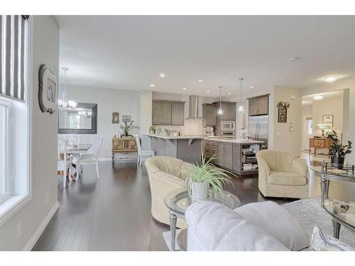 116 Sunset Manor, Cochrane, AB - Indoor Photo Showing Living Room