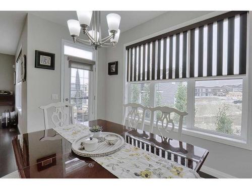 116 Sunset Manor, Cochrane, AB - Indoor Photo Showing Dining Room