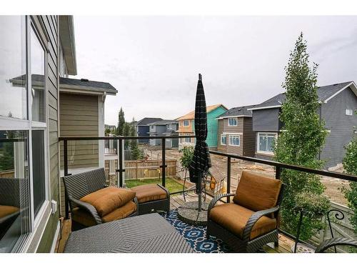 116 Sunset Manor, Cochrane, AB - Outdoor With Deck Patio Veranda With Exterior