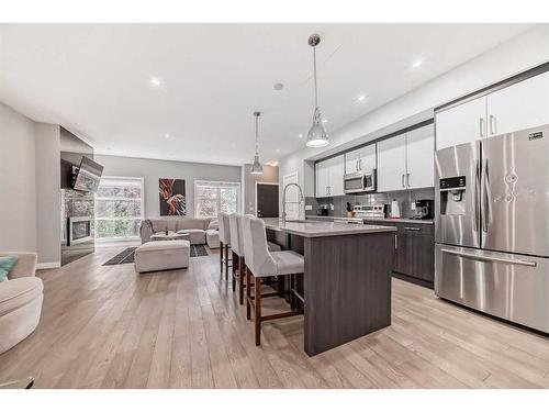 1-1714 Kensington Road Nw, Calgary, AB - Indoor Photo Showing Kitchen With Upgraded Kitchen