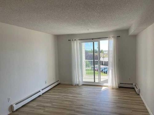 308-1717 60 Street Se, Calgary, AB - Indoor Photo Showing Other Room