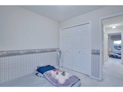 81 Taravista Way Ne, Calgary, AB - Indoor Photo Showing Bedroom