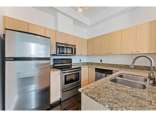 2003-1111 6 Avenue Sw, Calgary, AB - Indoor Photo Showing Kitchen With Double Sink