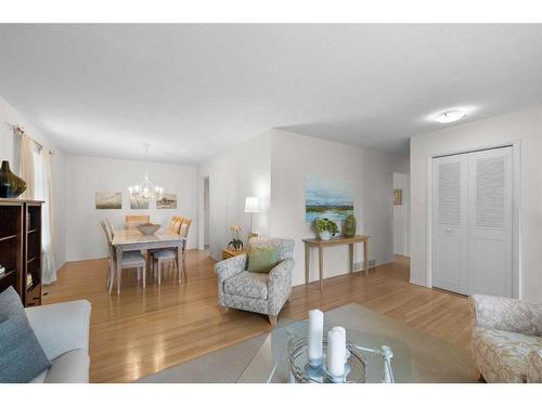 5852 Dalmead Crescent Nw, Calgary, AB - Indoor Photo Showing Living Room