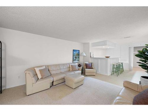 5852 Dalmead Crescent Nw, Calgary, AB - Indoor Photo Showing Living Room