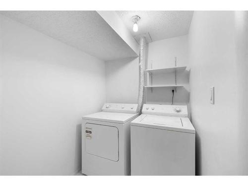 5852 Dalmead Crescent Nw, Calgary, AB - Indoor Photo Showing Laundry Room