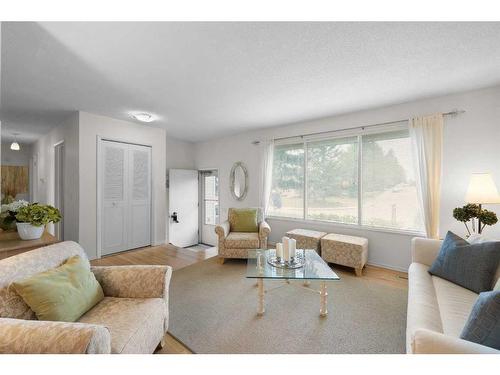 5852 Dalmead Crescent Nw, Calgary, AB - Indoor Photo Showing Living Room