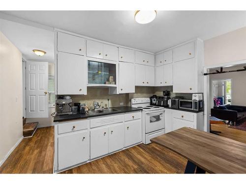 849 Mcpherson Road Ne, Calgary, AB - Indoor Photo Showing Kitchen