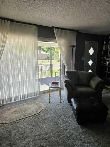 1613 13 Avenue North, Lethbridge, AB - Indoor Photo Showing Living Room