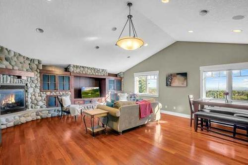 10909 Eamon Road Nw, Calgary, AB - Indoor Photo Showing Living Room With Fireplace