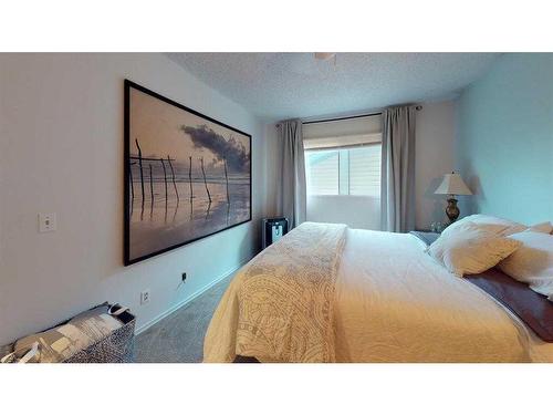 121 Sunbank Way Se, Calgary, AB - Indoor Photo Showing Bedroom