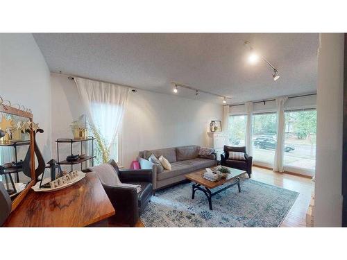 121 Sunbank Way Se, Calgary, AB - Indoor Photo Showing Living Room