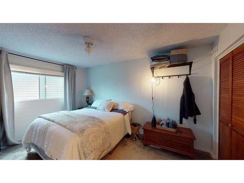 121 Sunbank Way Se, Calgary, AB - Indoor Photo Showing Bedroom