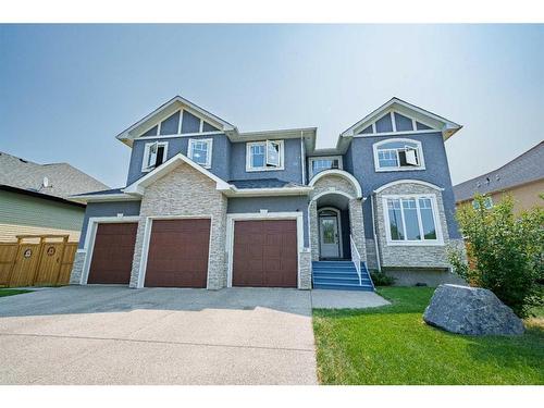 168 Kinniburgh Boulevard, Chestermere, AB - Outdoor With Facade