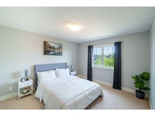 168 Kinniburgh Boulevard, Chestermere, AB - Indoor Photo Showing Bedroom