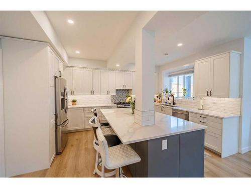 168 Kinniburgh Boulevard, Chestermere, AB - Indoor Photo Showing Kitchen With Stainless Steel Kitchen With Upgraded Kitchen