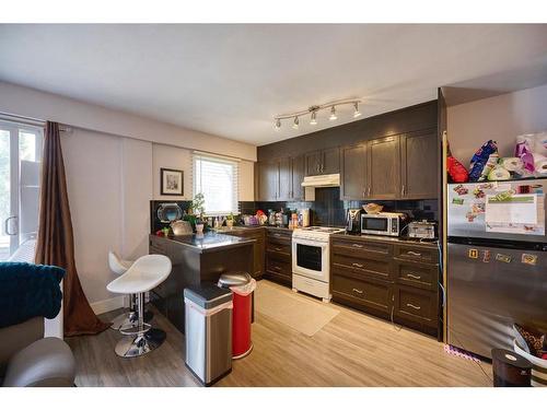 201-1027 12 Avenue Sw, Calgary, AB - Indoor Photo Showing Kitchen