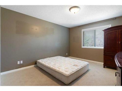 259 Chapalina Terrace Se, Calgary, AB - Indoor Photo Showing Bedroom