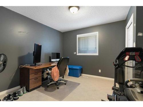 259 Chapalina Terrace Se, Calgary, AB - Indoor Photo Showing Gym Room