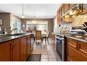 259 Chapalina Terrace Se, Calgary, AB  - Indoor Photo Showing Kitchen With Double Sink 