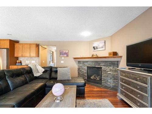 259 Chapalina Terrace Se, Calgary, AB - Indoor Photo Showing Living Room With Fireplace