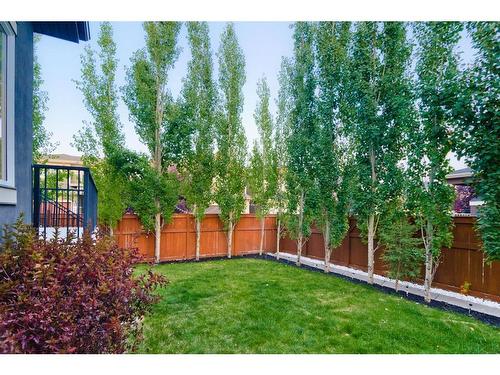 84 Aspen Dale Way Sw, Calgary, AB - Outdoor With Backyard