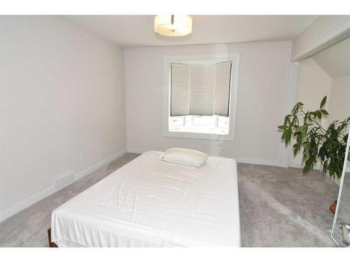 123 Huntchester Crescent Ne, Calgary, AB - Indoor Photo Showing Bedroom