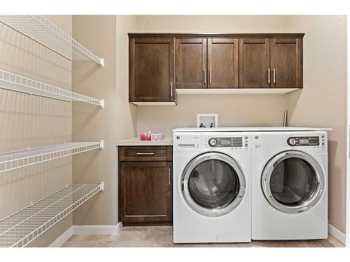 28 Cougar Ridge Manor Sw, Calgary, AB - Indoor Photo Showing Laundry Room