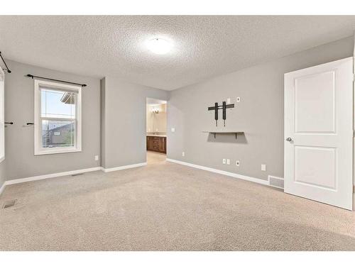 28 Cougar Ridge Manor Sw, Calgary, AB - Indoor Photo Showing Other Room