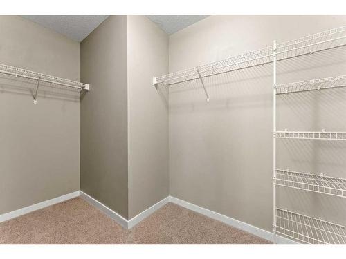 28 Cougar Ridge Manor Sw, Calgary, AB - Indoor With Storage