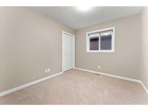 28 Cougar Ridge Manor Sw, Calgary, AB - Indoor Photo Showing Other Room