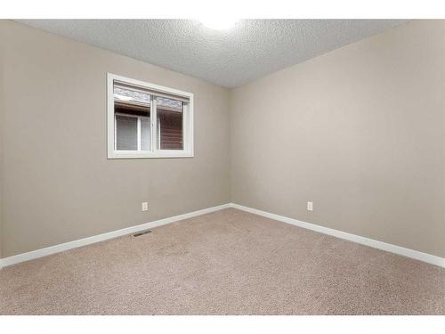 28 Cougar Ridge Manor Sw, Calgary, AB - Indoor Photo Showing Other Room