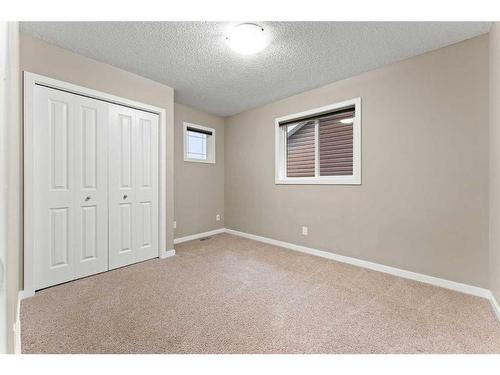 28 Cougar Ridge Manor Sw, Calgary, AB - Indoor Photo Showing Other Room