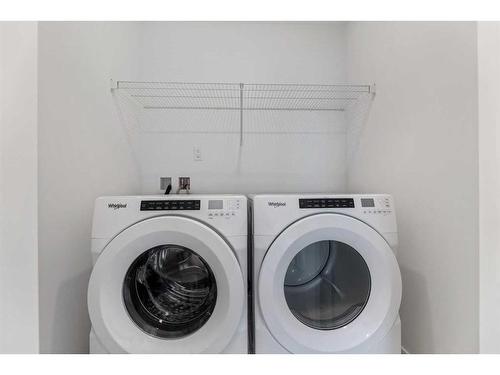 1305-280 Chelsea Road, Chestermere, AB - Indoor Photo Showing Laundry Room