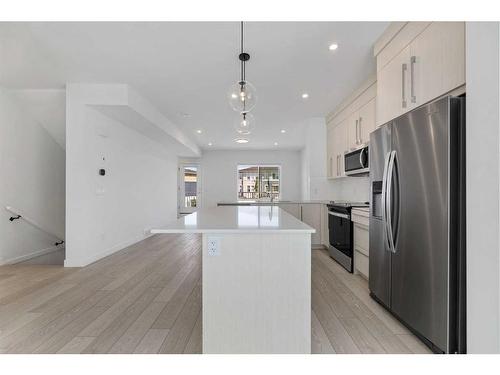 1305-280 Chelsea Road, Chestermere, AB - Indoor Photo Showing Kitchen With Stainless Steel Kitchen With Upgraded Kitchen