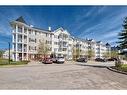 1306-5 Country Village Park Ne, Calgary, AB  - Outdoor With Balcony With Facade 