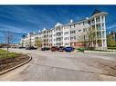 1306-5 Country Village Park Ne, Calgary, AB  - Outdoor With Balcony With Facade 