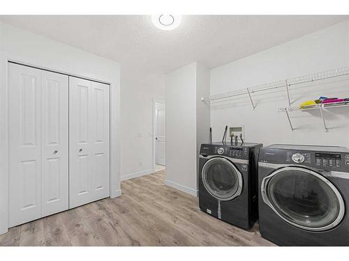 60 Panorama Hills Place Nw, Calgary, AB - Indoor Photo Showing Laundry Room