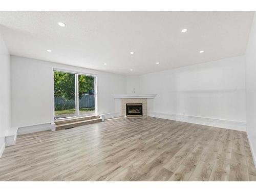 60 Panorama Hills Place Nw, Calgary, AB - Indoor Photo Showing Living Room With Fireplace