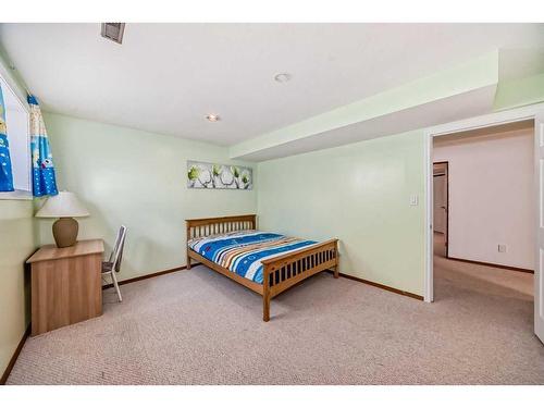 240 Arbour Ridge Way Nw, Calgary, AB - Indoor Photo Showing Bedroom